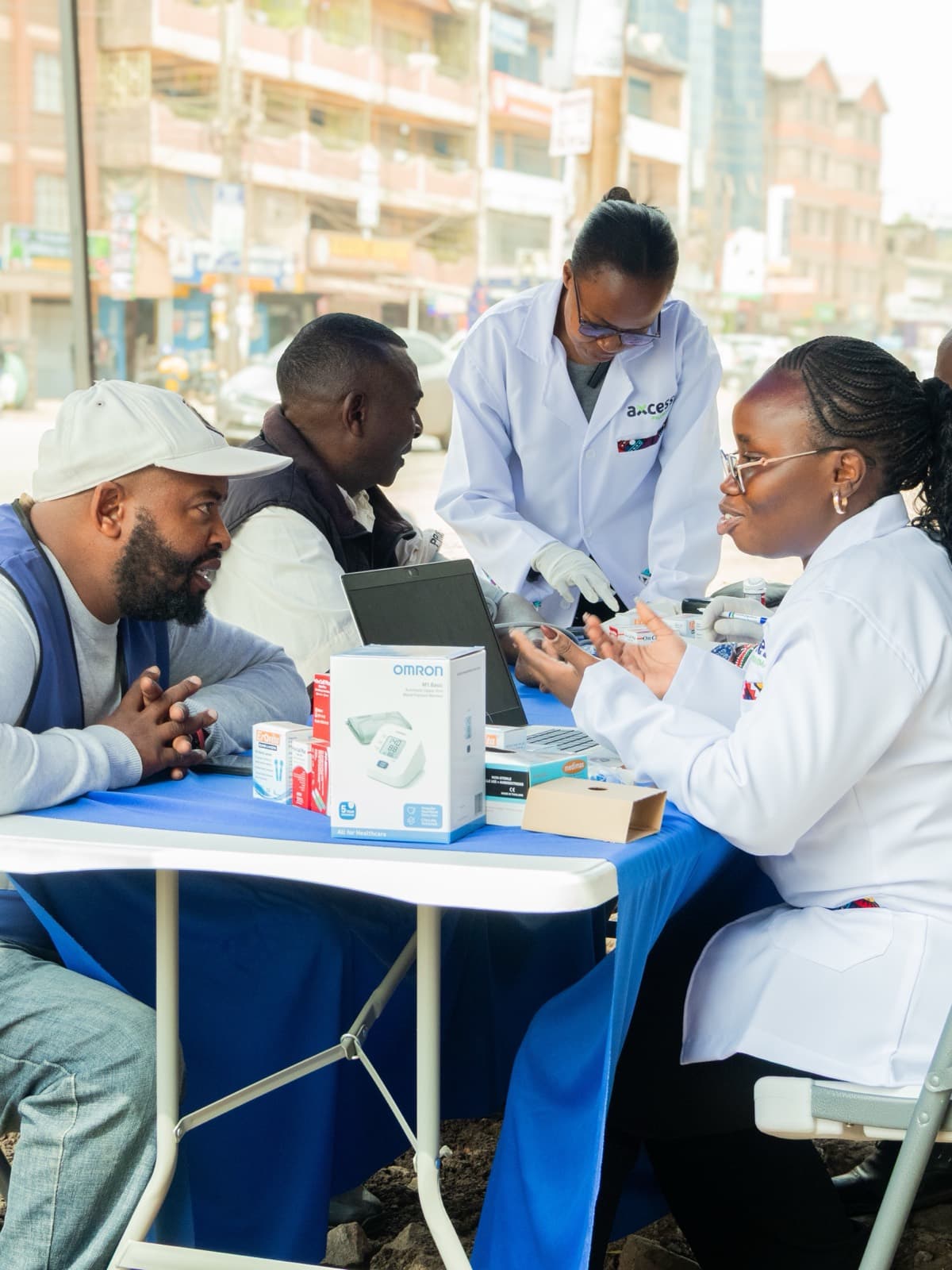 Axcess Pharmacy care team running a community health screening